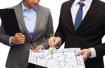 Image showing businesspeople with clipboard and blueprint