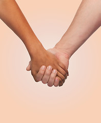 Image showing woman and man holding hands