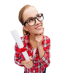 Image showing smiling woman in black eyeglasses with diploma