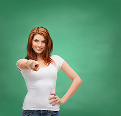 Image showing teenager in blank white t-shirt pointing at you