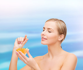 Image showing lovely woman with omega 3 vitamins