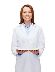 Image showing smiling female doctor and tablet pc computer