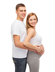 Image showing happy young family expecting child