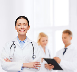 Image showing smiling female doctor with stethoscope