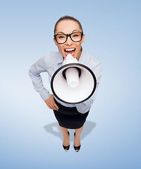 Image showing screaming businesswoman with megaphone