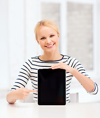 Image showing smiling teenage girl with blank tablet pc screen