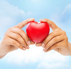 Image showing female hands with heart