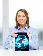 Image showing smiling businesswoman with tablet pc computer