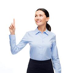 Image showing smiling woman with her finger up