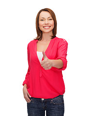 Image showing smiling woman showing thumbs up