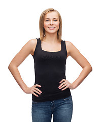 Image showing smiling woman in blank black tank top