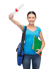 Image showing smiling student with bag, folders and diploma