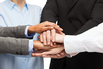 Image showing group of businesspeople celebrating victory