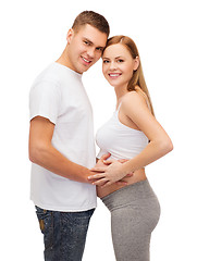 Image showing happy young family expecting child