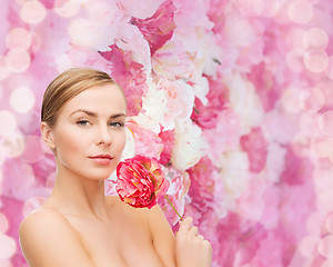 Image showing lovely woman with peonie flower