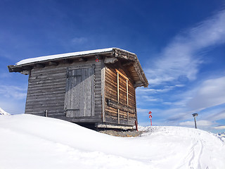 Image showing Old wooden barn in a sunny day
