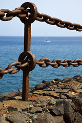 Image showing rusty chain  water  boat yacht coastline and summer in lanzarote