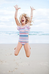 Image showing Young girl having fun at beach