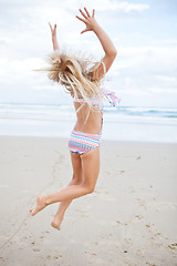 Image showing Young girl having fun at beach