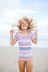 Image showing Young girl having fun at beach