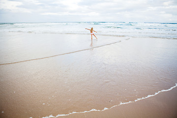 Image showing Young girl having fun at beach