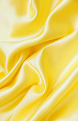 Image showing Smooth elegant golden silk as background 