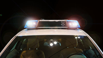 Image showing Police car with flash lights and siren