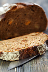 Image showing Rye bread with dried apricots close-up.