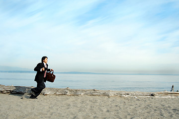 Image showing Running businessman