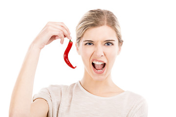 Image showing Beautiful woman holding a red chilli pepper