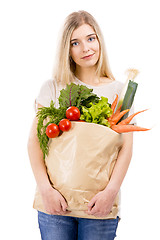 Image showing Beautiful woman carrying vegetables