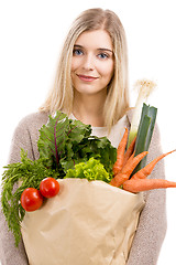 Image showing Beautiful woman carrying vegetables