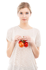 Image showing Beaitiful woman holding red tomatos