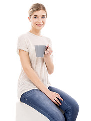 Image showing Beautiful woman drinking coffee