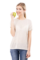 Image showing Beautiful woman with a green apple