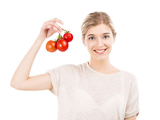 Image showing Beaitiful woman holding red tomatos