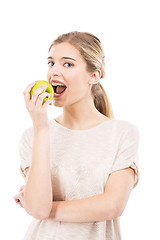 Image showing Eating a green apple