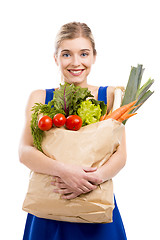 Image showing Beautiful woman carrying vegetables