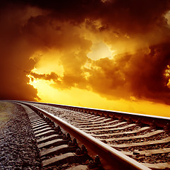 Image showing railroad closeup to orange horizon in sunset