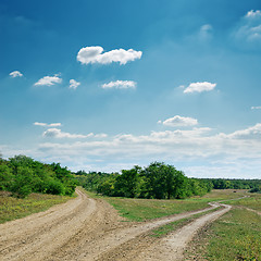 Image showing two rural road under cloudy sky