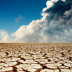 Image showing cracked earth and dramatic sky