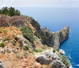 Image showing rocky headland in sea and fortress wall in Alanya