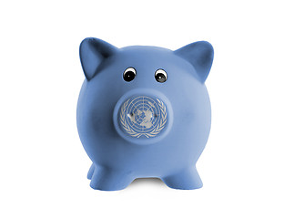 Image showing Ceramic piggy bank with painting of national flag 