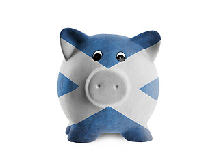 Image showing Ceramic piggy bank with painting of national flag 