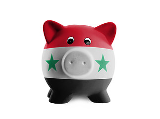 Image showing Ceramic piggy bank with painting of national flag 