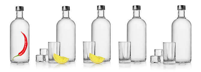 Image showing Bottles of vodka and glasses