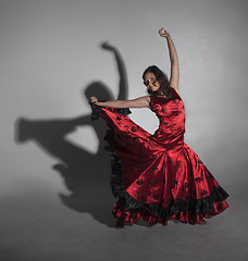 Image showing Young woman dancing flamenco