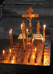 Image showing candles and crucifix in church