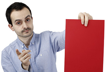 Image showing Man holding a paper