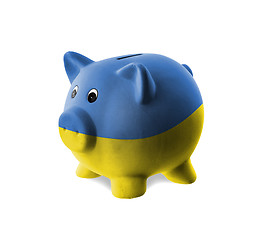 Image showing Ceramic piggy bank with painting of national flag 